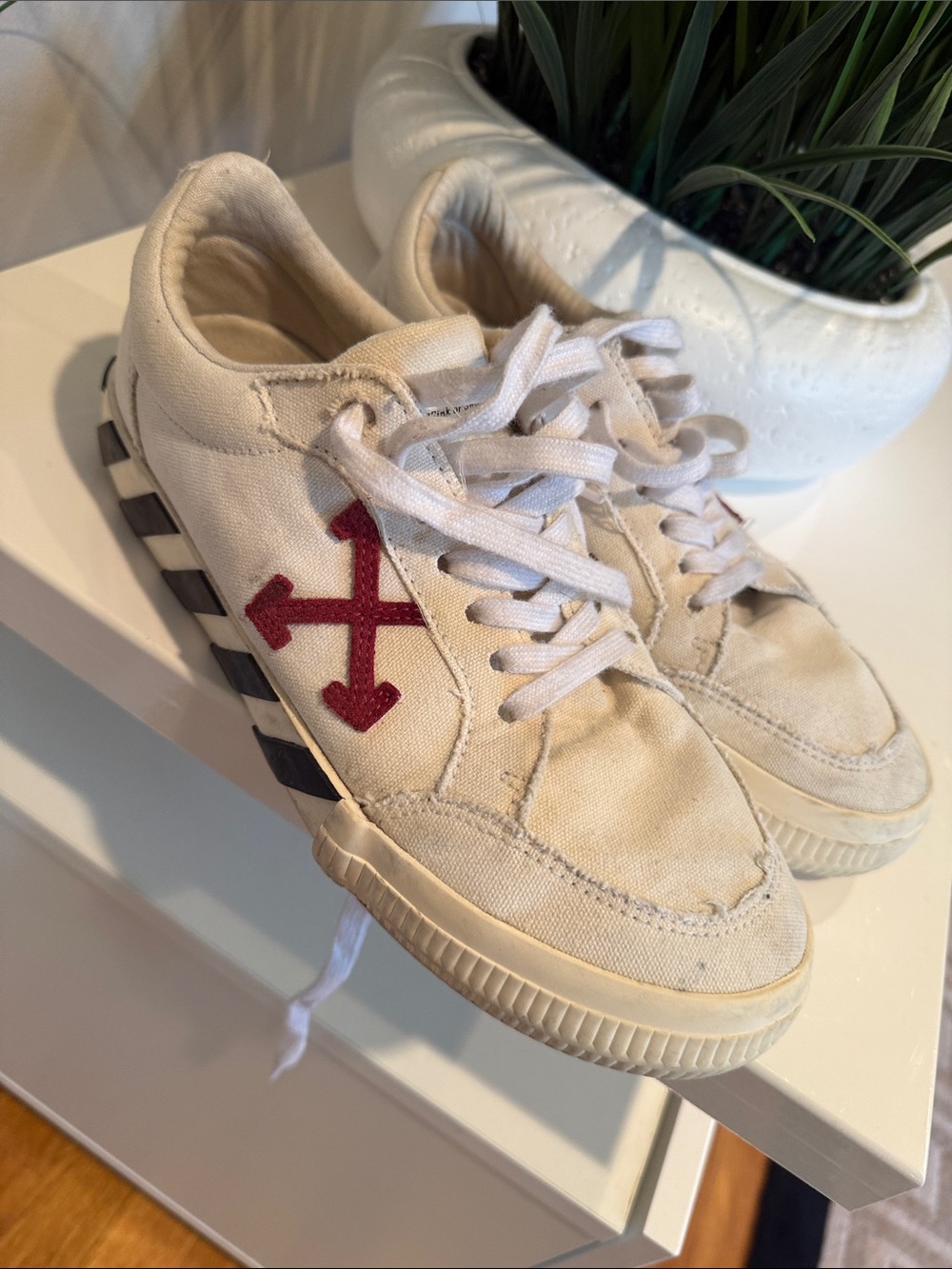 White Canvas Sneakers with Red Arrow Logo